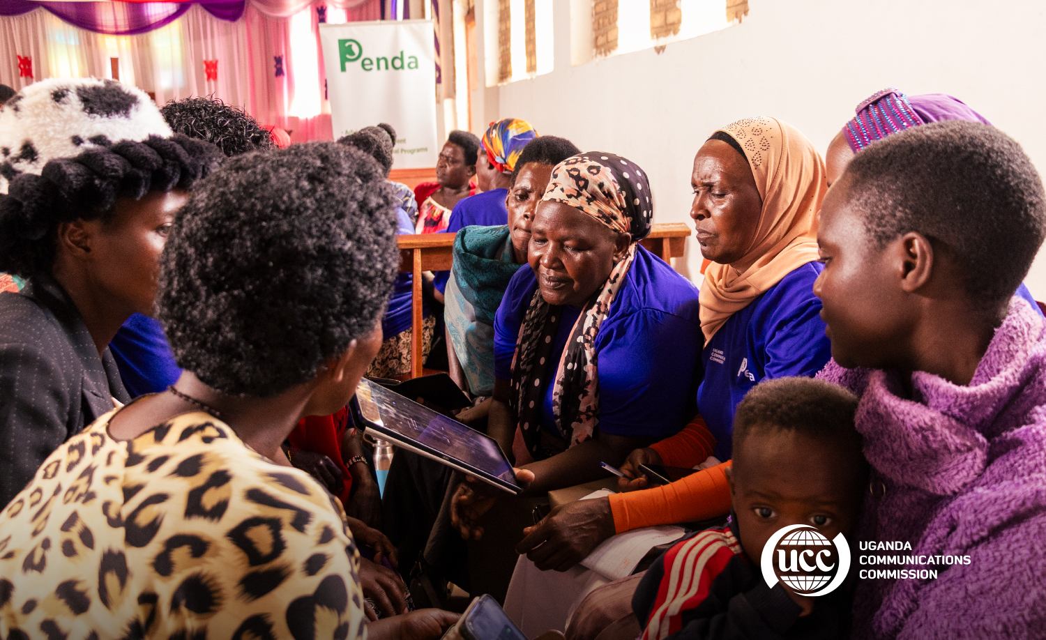 Mentorship and story-gathering session capturing how women entrepreneurs apply digital tools in daily trade.
