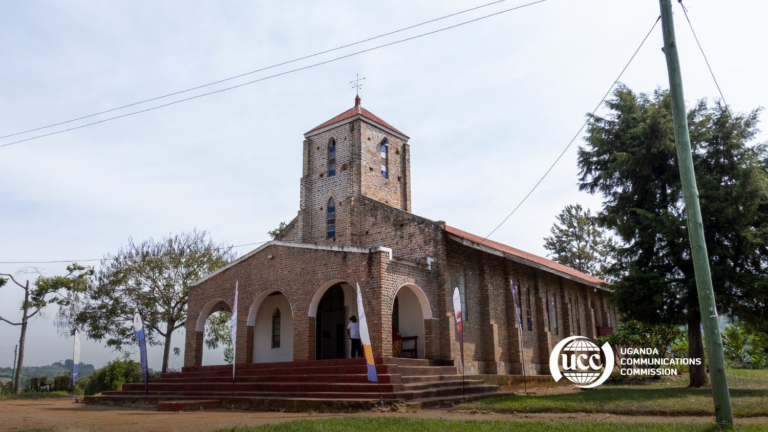 Exterior view of one of more than 50 district community venues covered across Uganda between 2024 and 2026.